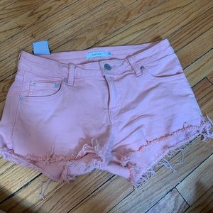 Pink low rise Aritzia/ Talula Denim shorts